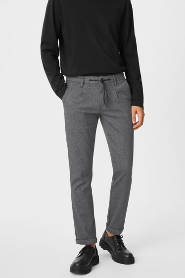 Hommes - Chino - tapered fit - gris chiné