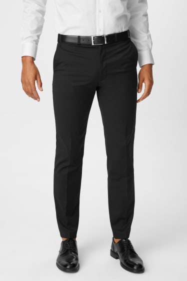 Hombre - Pantalón de traje - regular fit - elástico - negro