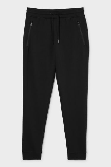 Uomo - Pantaloni sportivi - nero