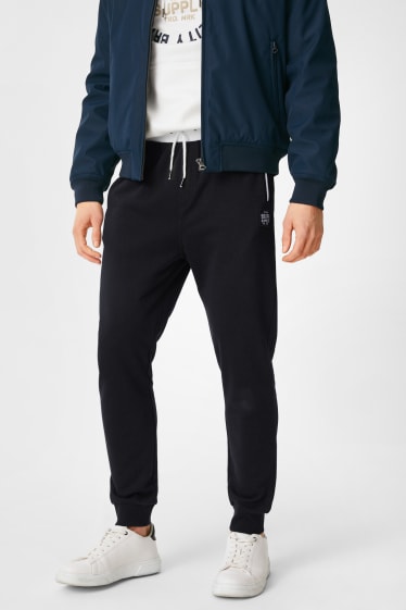 Uomo - Pantaloni sportivi - blu scuro