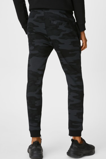 Hommes - CLOCKHOUSE - pantalon de jogging - noir