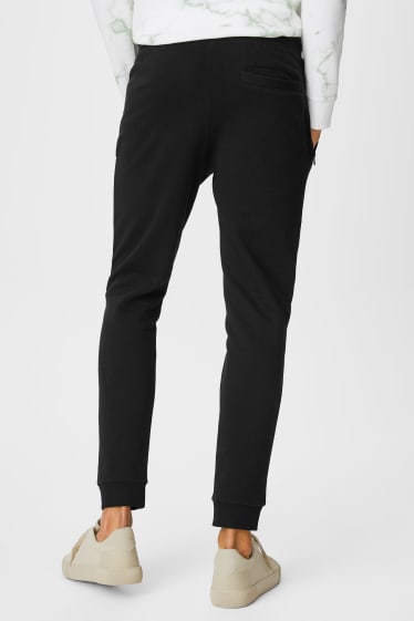 Hommes - Pantalon de jogging - noir