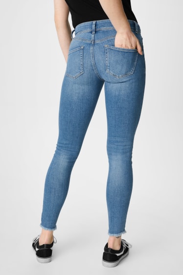 Dames - CLOCKHOUSE - skinny jeans - push-up-effect - jeanslichtblauw