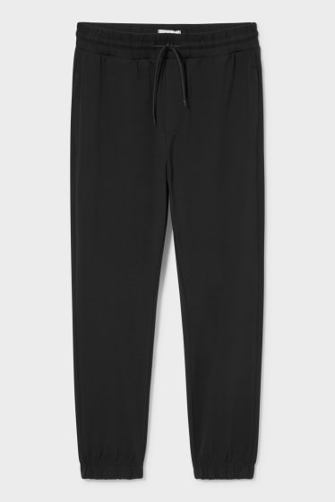 Pánské - Teplákové kalhoty - Flex - LYCRA® - černá