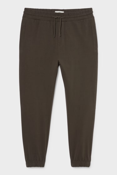 Mężczyźni - Spodnie dresowe - Flex - LYCRA® - ciemnozielony