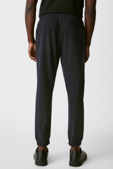 Pánské - Teplákové kalhoty - Flex - LYCRA® - černá