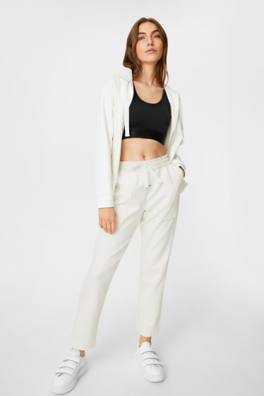 Donna - Pantaloni sportivi - bianco crema