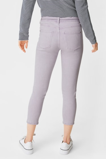 Women - Skinny jeans with belt - light violet