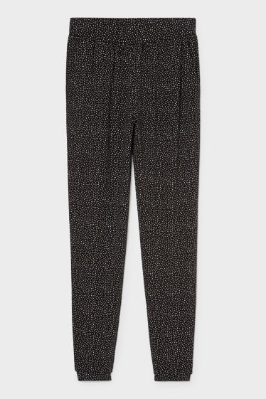 Femei - Pantaloni din stofă – imprimeu minimal - negru