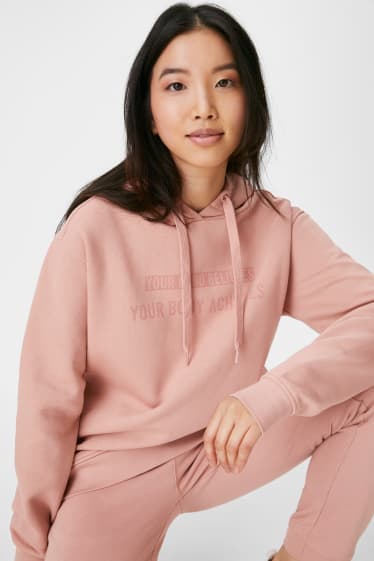 Femmes - Sweat à capuche sportif - rose / rouge foncé