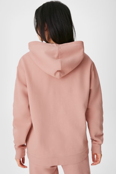 Femmes - Sweat à capuche sportif - rose / rouge foncé