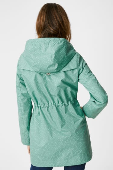 Damen - Regenjacke mit Kapuze - gepunktet - dunkelblau