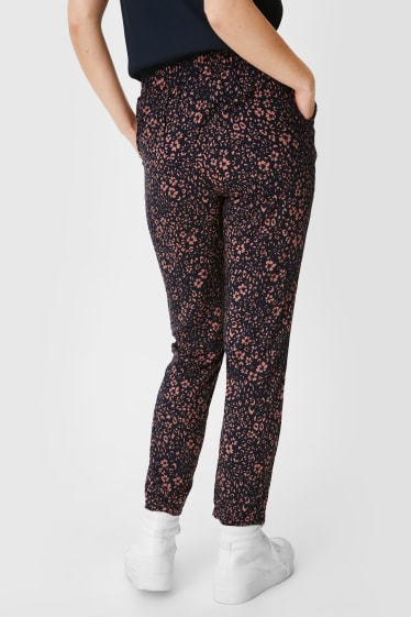 Dámské - Plátěné kalhoty - s květinovým vzorem - černá