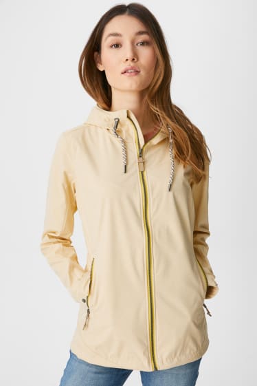 Women - Softshell jacket with hood - yellow