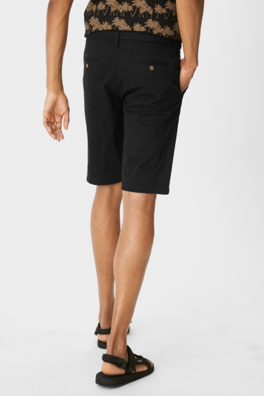 Hombre - CLOCKHOUSE - shorts con cinturón - negro
