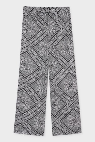 Women - Cloth trousers - palazzo - black / white