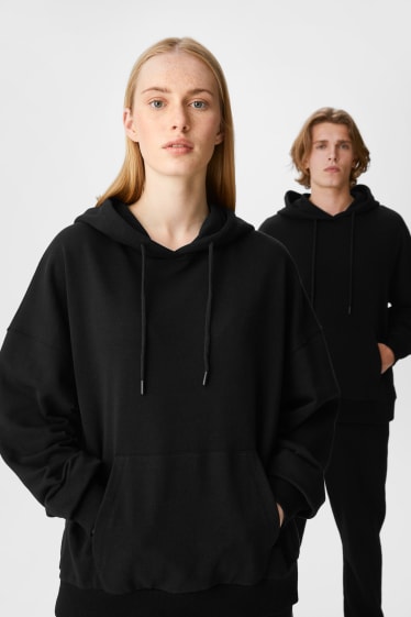 Tieners & jongvolwassenen - CLOCKHOUSE - hoodie - unisex - zwart