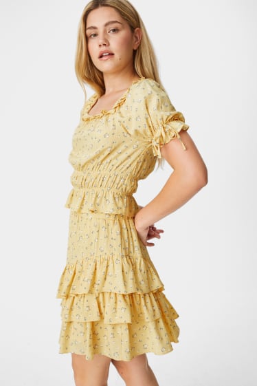 Femmes - Mini-jupe ornée de ruchés - motif floral - jaune clair