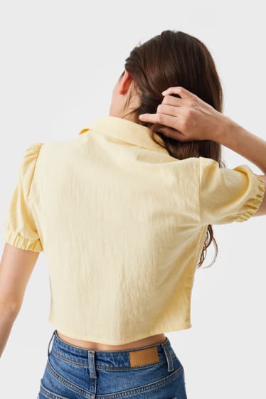 Kobiety - CLOCKHOUSE - bluzka - jasnożółty
