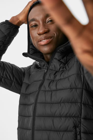 Men - Quilted jacket with hood - black