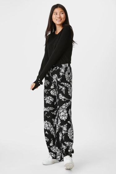 Femmes - Pantalon de toile - jambes larges - motif floral - noir