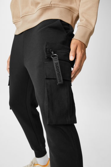 Hommes - CLOCKHOUSE - pantalon de jogging cargo - noir
