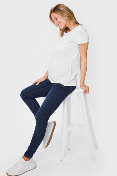 Dámské - Tvarující těhotenské džíny - skinny fit - džíny - tmavomodré