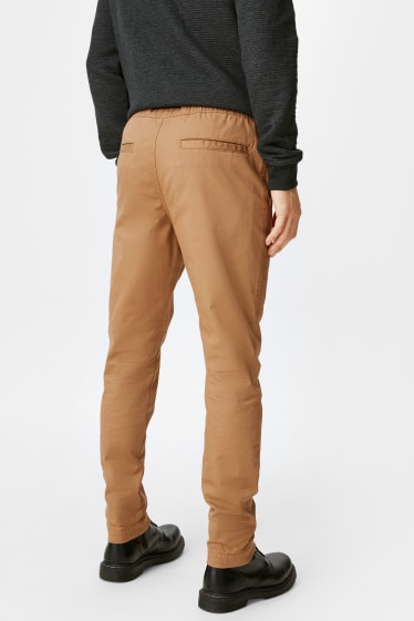 Hombre - CLOCKHOUSE - pantalón de tela - tapered fit - beis