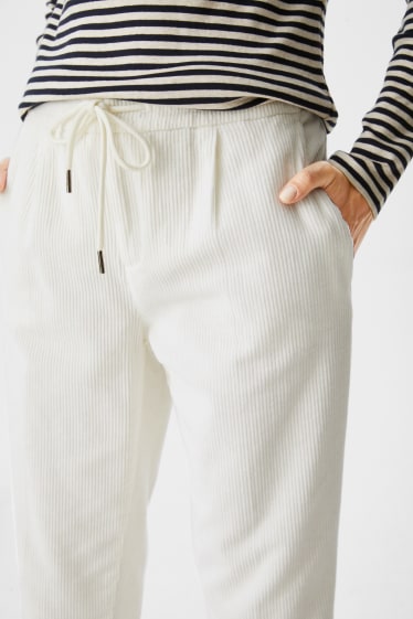 Donna - Pantaloni di velluto a coste - tapered fit - bianco