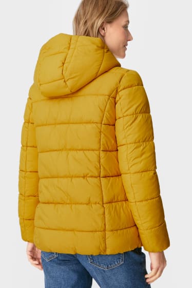 Women - Maternity quilted jacket with hood and baby pouch - yellow