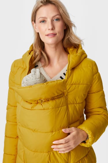Women - Maternity quilted jacket with hood and baby pouch - yellow