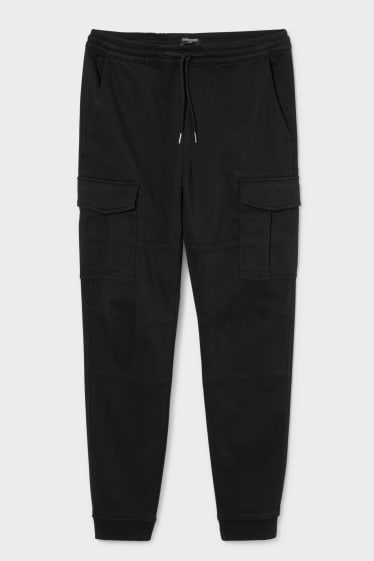 Mężczyźni - CLOCKHOUSE - spodnie bojówki - slim fit - LYCRA® - czarny