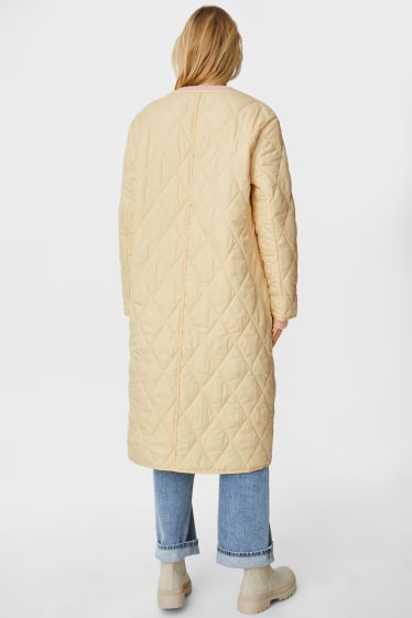 Women - Quilted coat - yellow