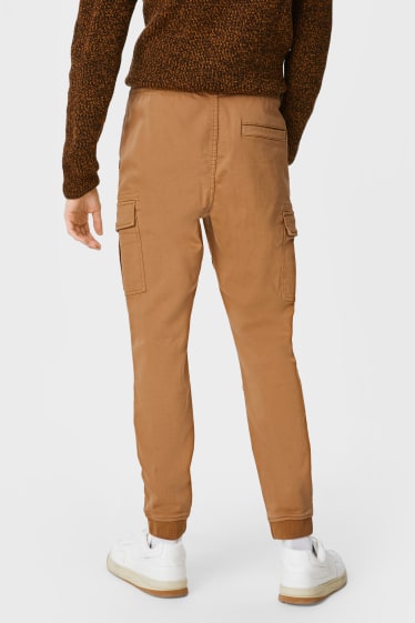 Mężczyźni - CLOCKHOUSE - spodnie bojówki - slim fit - LYCRA® - beżowy