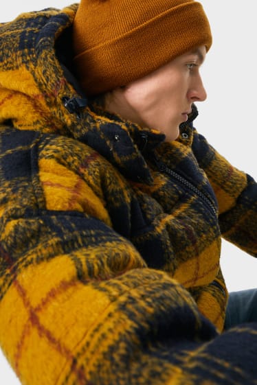 Hommes - CLOCKHOUSE - veste matelassée à capuche - matière recyclée - jaune