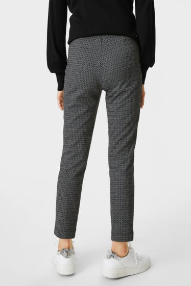 Dames - Jersey broek - slim fit - zwart / wit