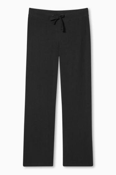 Dámské - Žerzejové kalhoty - straight fit - černá
