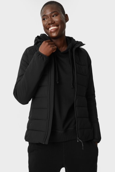 Women - Quilted jacket with hood - THERMOLITE® - black