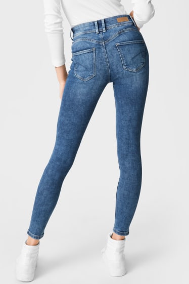 Dámské - CLOCKHOUSE - skinny jeans - push-up efekt - džíny - modré
