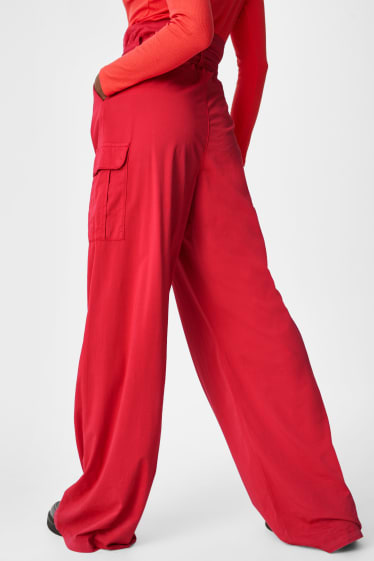 Women - Paper bag trousers - loose fit - red