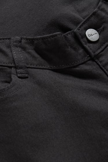Dámské - Těhotenské džíny - skinny jeans - černá