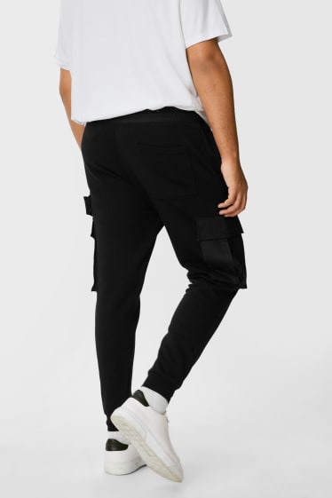 Uomo - CLOCKHOUSE - pantaloni sportivi cargo - nero