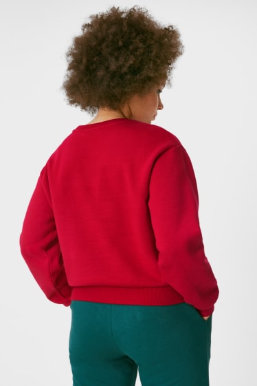 Ados & jeunes adultes - CLOCKHOUSE - sweat-shirt de Noël - finition brillante - Peanuts - rouge