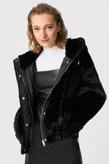 Teens & young adults - CLOCKHOUSE - faux fur jacket with hood - black