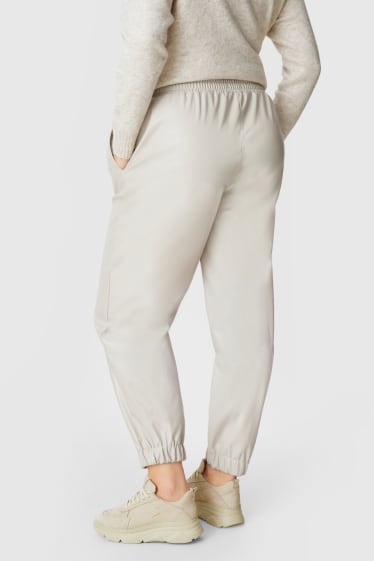 Women - Joggers - faux leather - creme