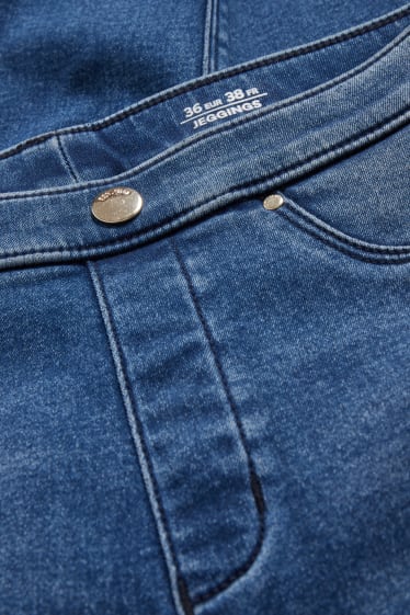 Kobiety - Jegging jeans - jegginsy ocieplane - efekt push-up - dżins-niebieski