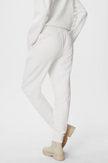 Dámské - Teplákové kalhoty - krémově bílá