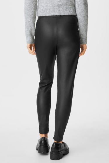 Damen - Umstands-Leggings - Lederimitat - schwarz