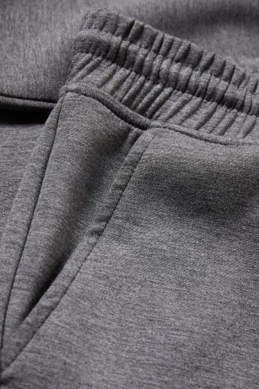 Dámské - Teplákové kalhoty - šedá-žíhaná