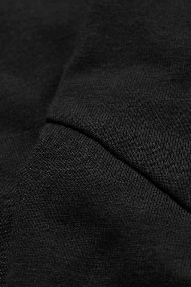 Dámské - Žerzejové těhotenské kalhoty - černá